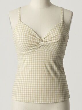Checkered top with cross front and stretchy back. Adjustable spaghetti straps.